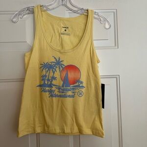 New women’s Hurley yellow pull over cotton silkscreen tank top. Size small